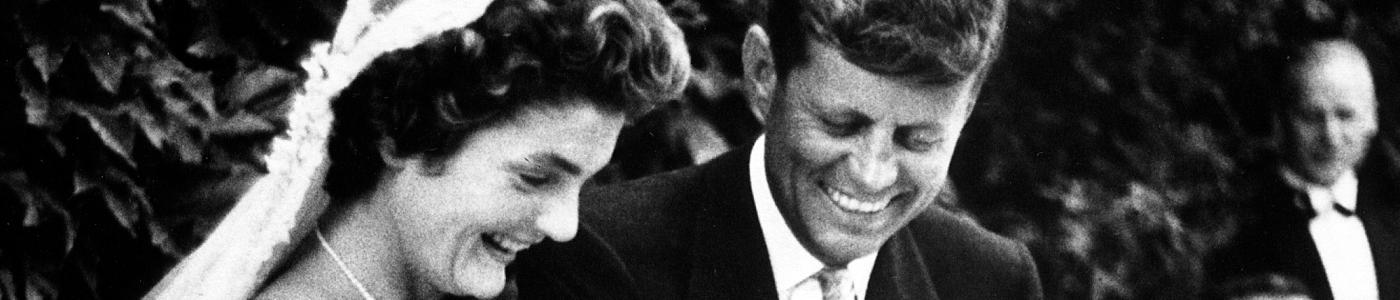 President and Mrs. Kennedy cut their wedding cake
