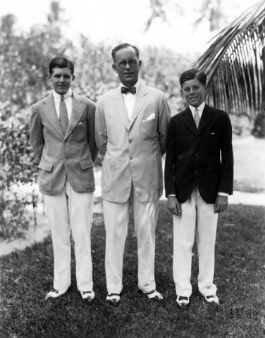 KFC461P. Joseph P. Kennedy Sr. with sons Joe Jr. and Jack, Palm Beach, 1931